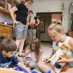 The Lab School's Body Mechanics camp (ages 4-7) are going into Jenny Buckley's engineering lab and learning about the skeleton, working with xrays, 'fixing' broken bones, etc., the students will design prosthetics for a stuffed dog. ID's: UD students Grey top, hair in bun – Makenzie Mullen ECE major Grey top long brown hair – Jordyn Schrader – bio engineering White/pink peasant blouse – Danielle Gerstman – mech engineering alum Blue UD heart shirt – Erin Rezich – mech engineering LPS camp Kids Boys Blue Tshirt (fixed dog’s leg) Sean White shirt orange shorts – Alex Green plaid shirt – Aaryan Girls White shirt – Mehr Pink shirt Ella Blue patterned shirt Emerson Blue shirt purple shorts – Izzie (Who may have limited permission, so we have to show to LPS.)