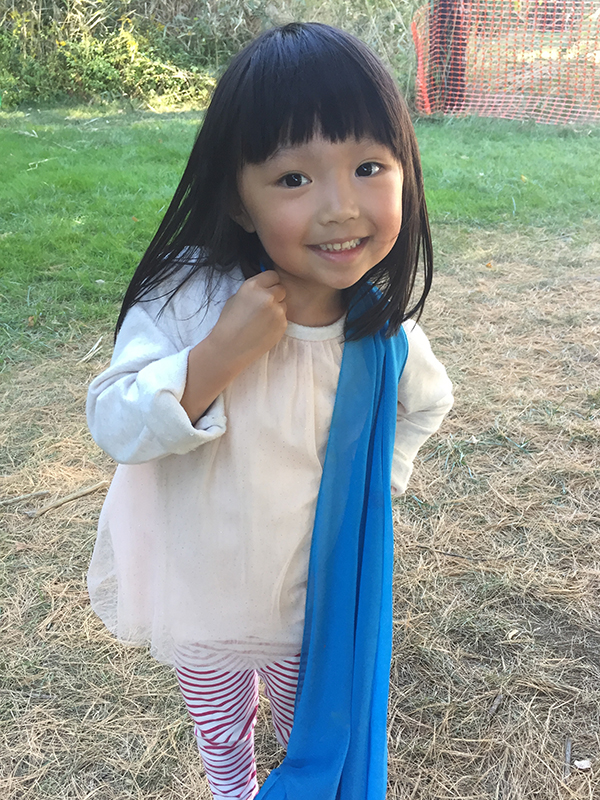 Smiling child outside at the UD Lab School