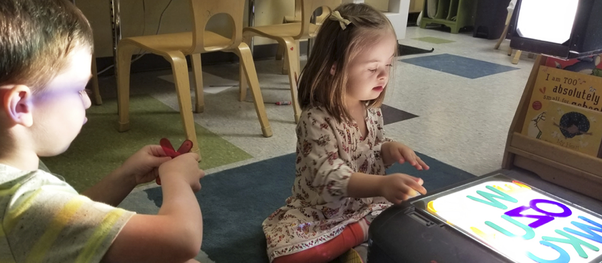 Two students working on an educational activity at the UD Lab School